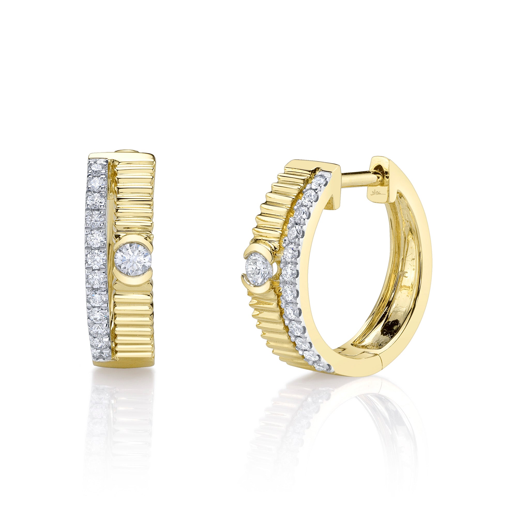 0.25CT 14K Y/G DIAMOND RIBBED HUGGIE EARRING
