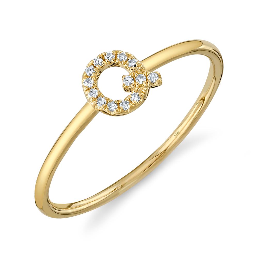 0.04CT 14K Y/G DIAMOND LADYS RING - INITIAL Q