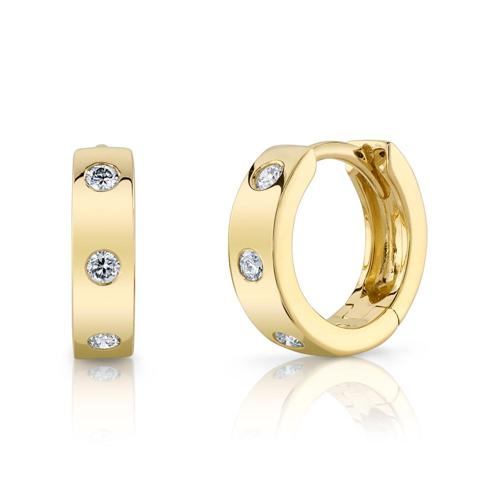 0.11CT 14K Y/G DIAMOND MINI HUGGIE EARRING