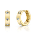 0.11CT 14K Y/G DIAMOND MINI HUGGIE EARRING