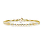0.64CT 14K Y/G DIAMOND BEZEL TENNIS BRACELET