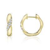 0.23CT 14K Y/G DIAMOND TWISTED HUGGIE EARRING