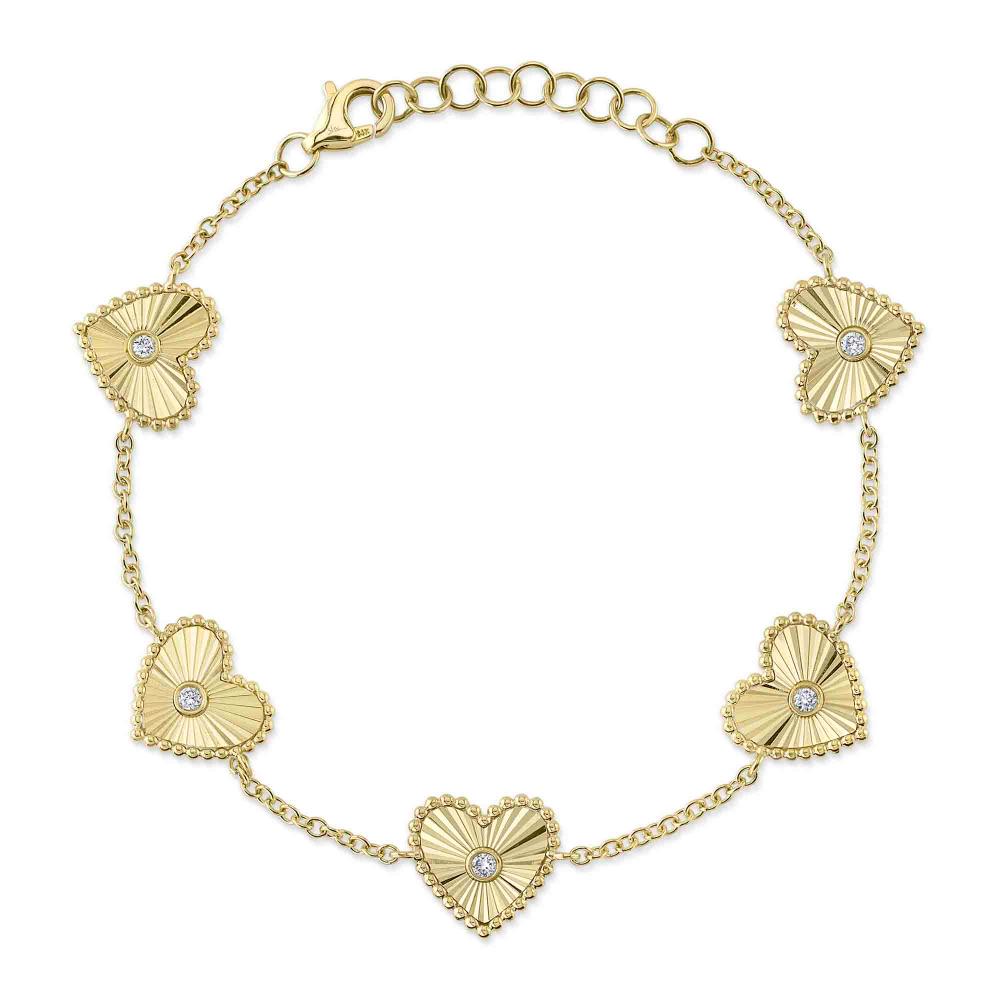 0.10CT 14K Y/G DIAMOND BEZEL RIBBED HEART BRACELET