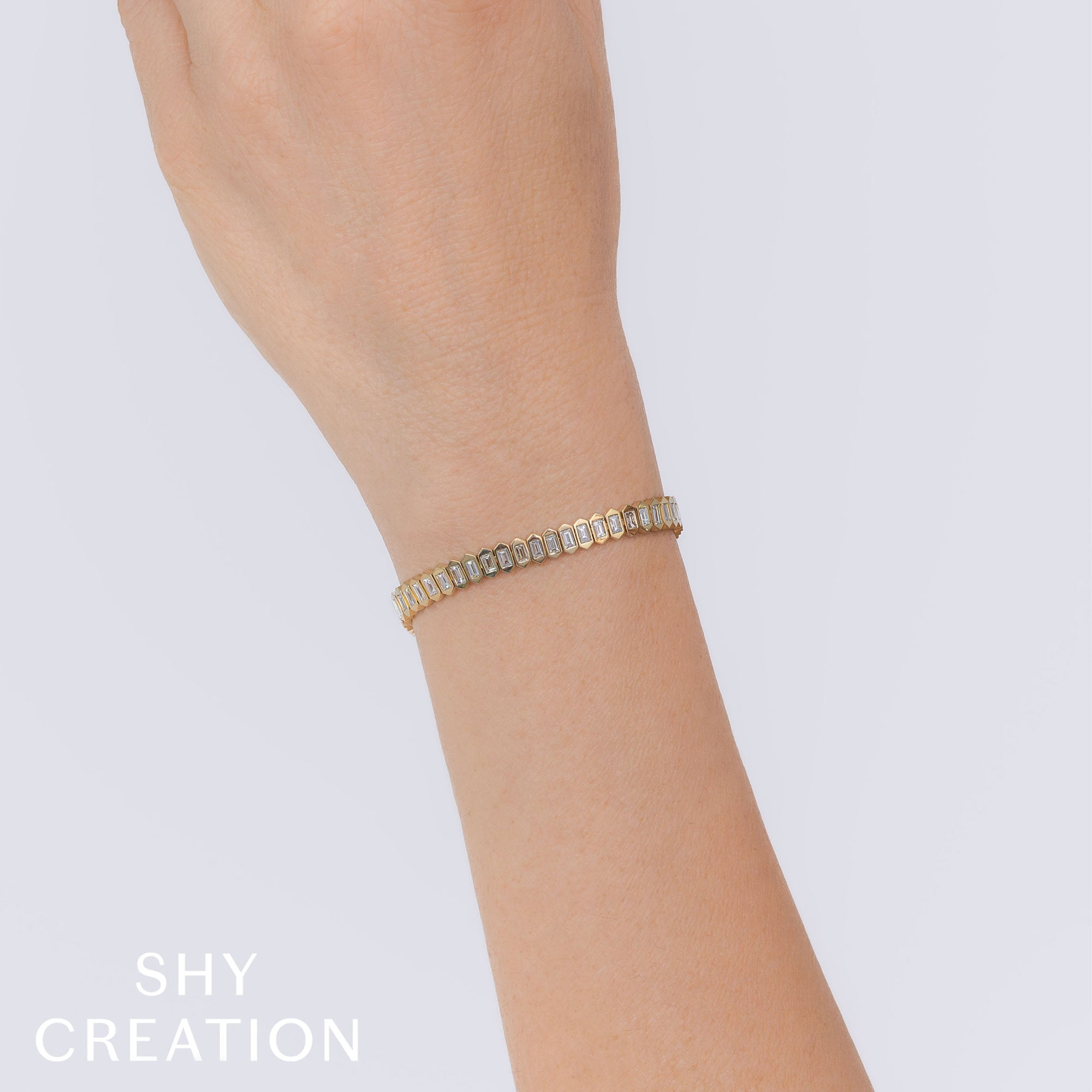 3.25CT 14K Y/G DIAMOND BAGUETTE BEZEL TENNIS BRACELET