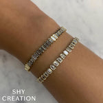 6.62CT 14K Y/G DIAMOND EMERALD BEZEL TENNIS BRACELET