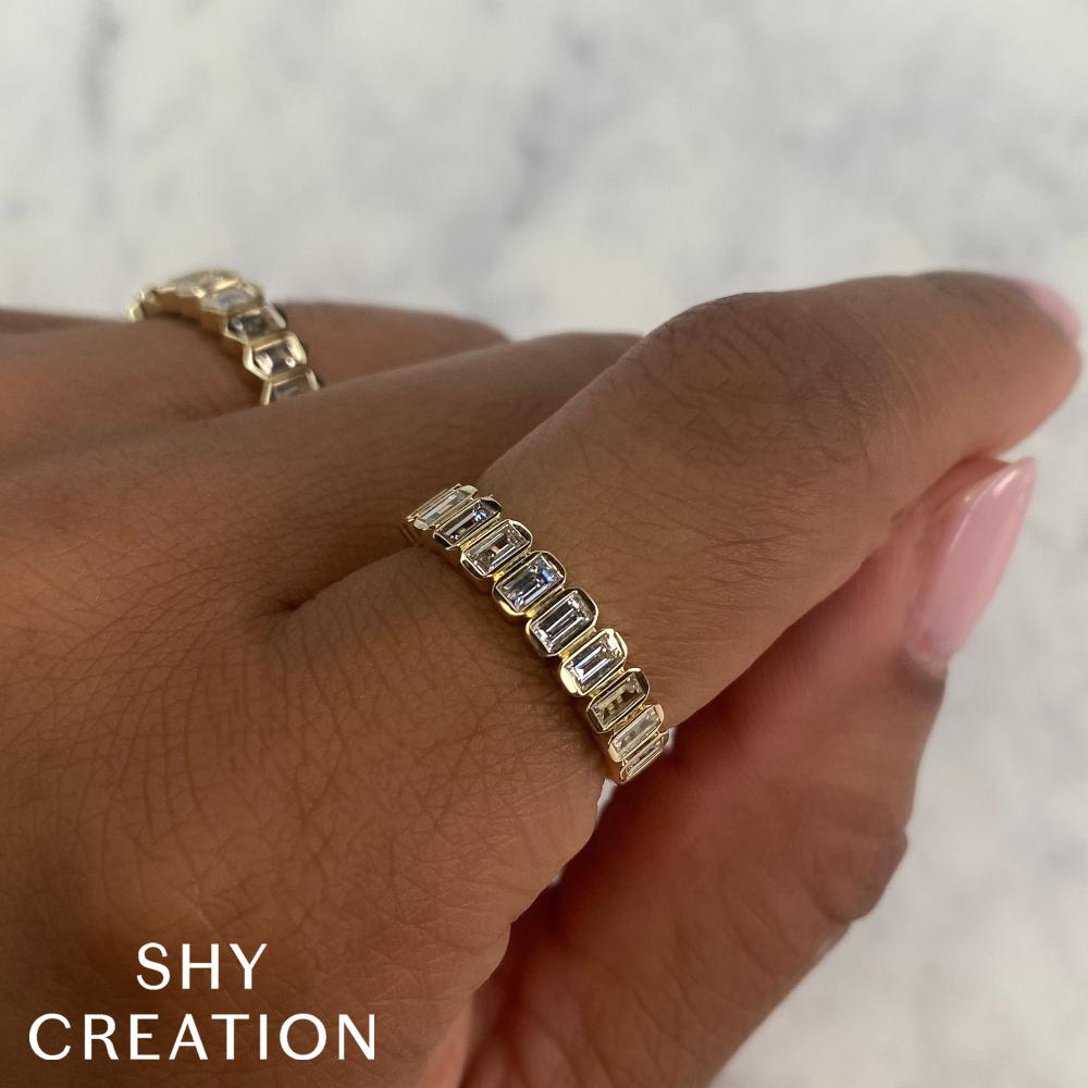 0.78CT 14K Y/G DIAMOND BAGUETTE BEZEL BAND