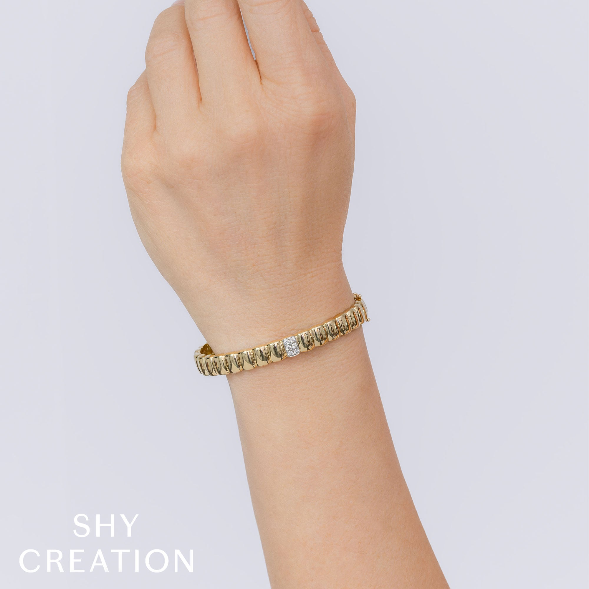 0.15CT 14K Y/G DIAMOND BANGLE