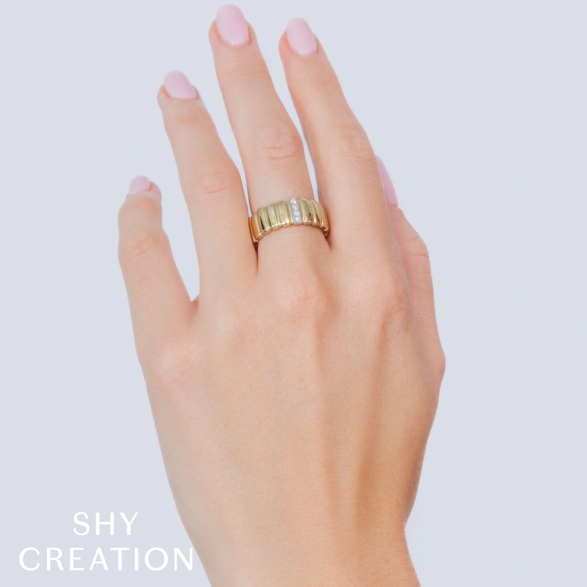 0.07CT 14K Y/G DIAMOND RIBBED RING