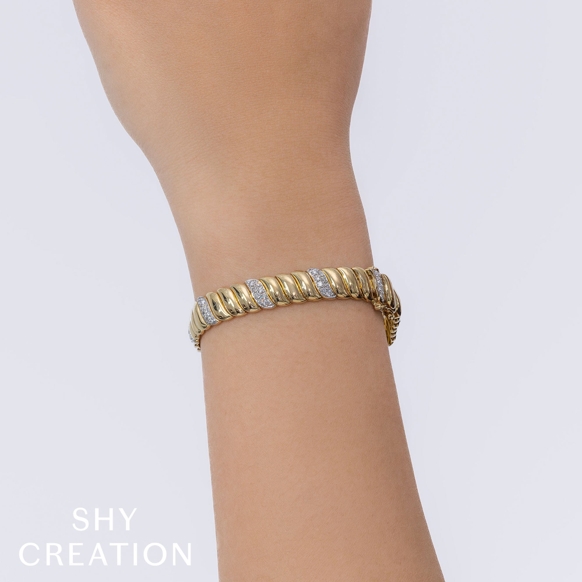 1.48CT 14K Y/G DIAMOND RIBBED BRACELET
