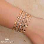 0.90CT 14K Y/G DIAMOND GEO CUT BRACELET