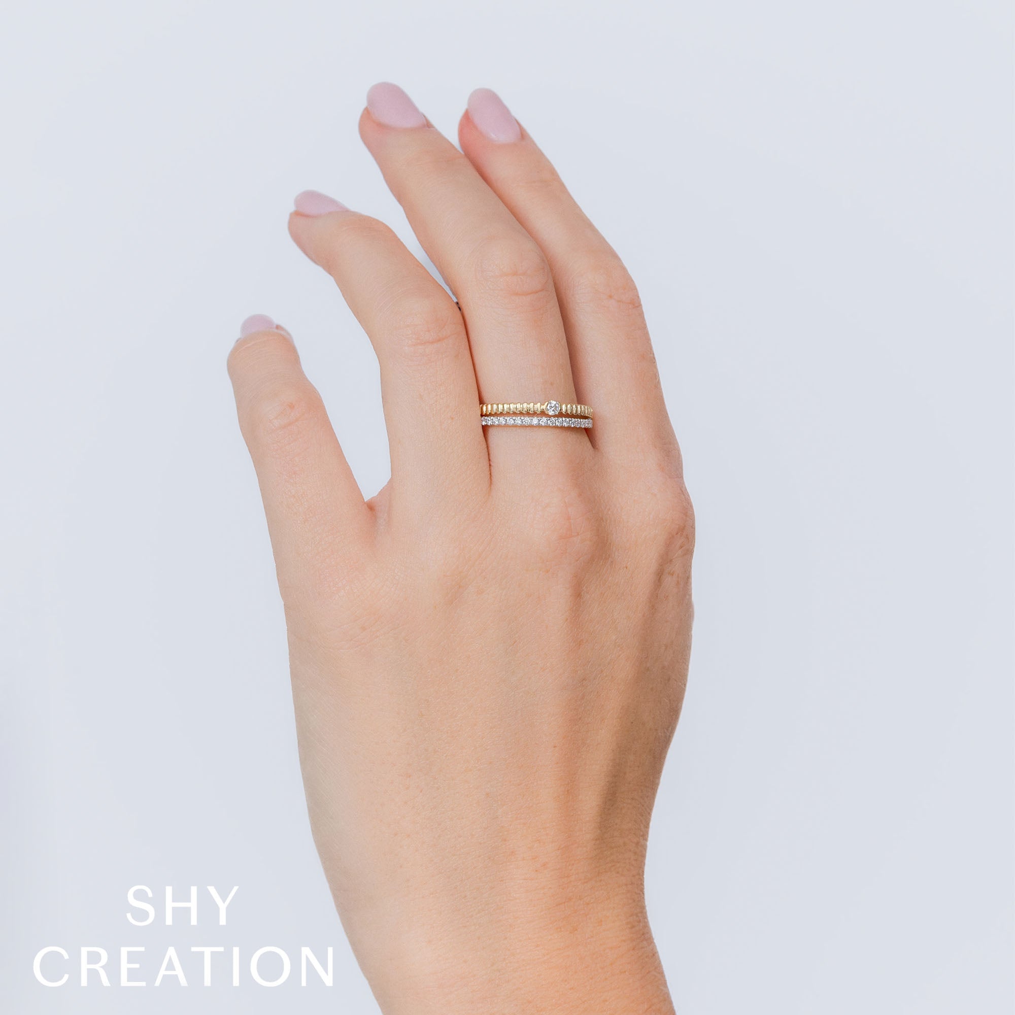 0.23CT 14K Y/G DIAMOND RIBBED RING