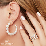 0.22CT 14K Y/G DIAMOND BEZEL STUD EARRING