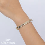 0.97CT 14K Y/G DIAMOND BANGLE