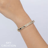 0.97CT 14K Y/G DIAMOND BANGLE