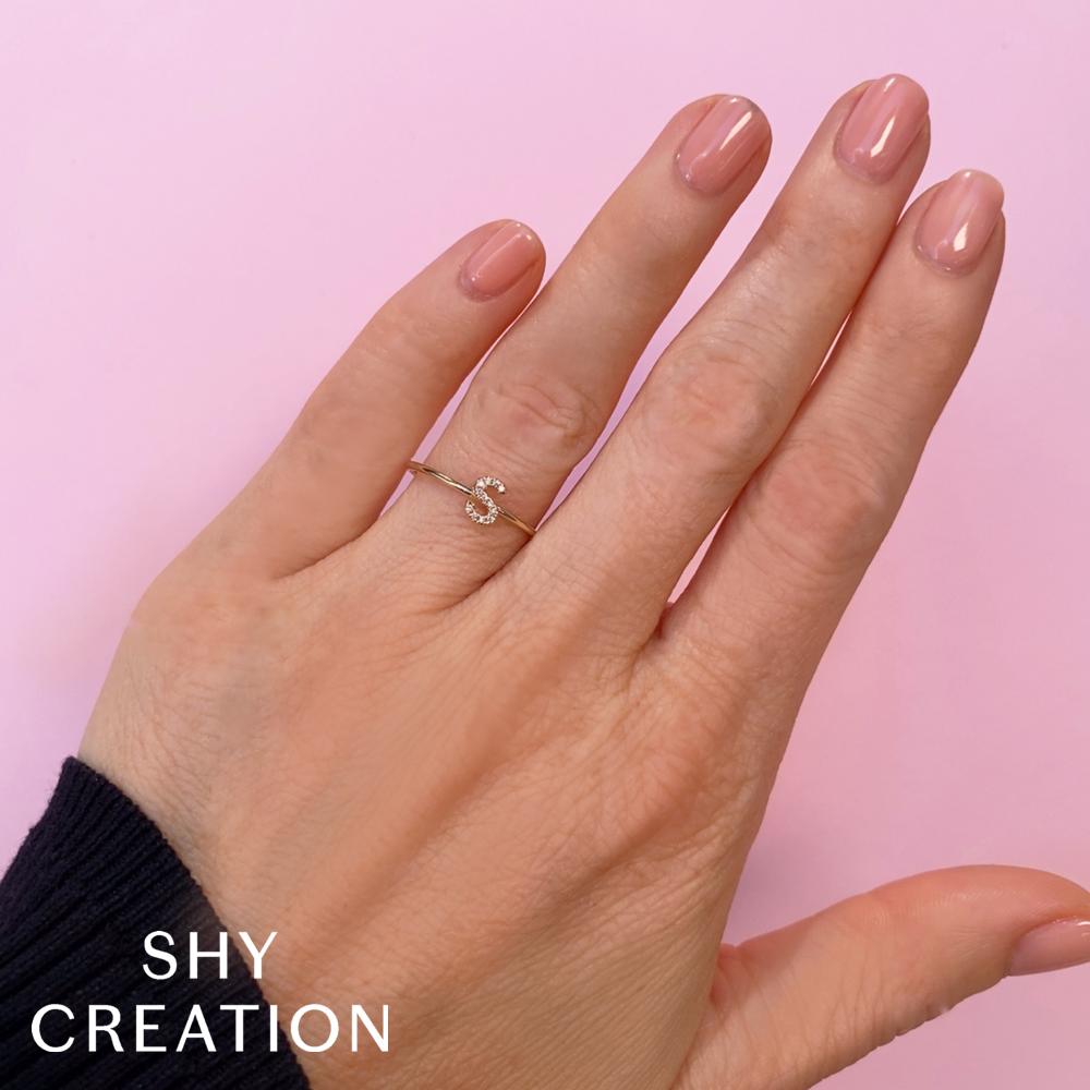 0.05CT 14K W/G DIAMOND LADYS RING - INITIAL E
