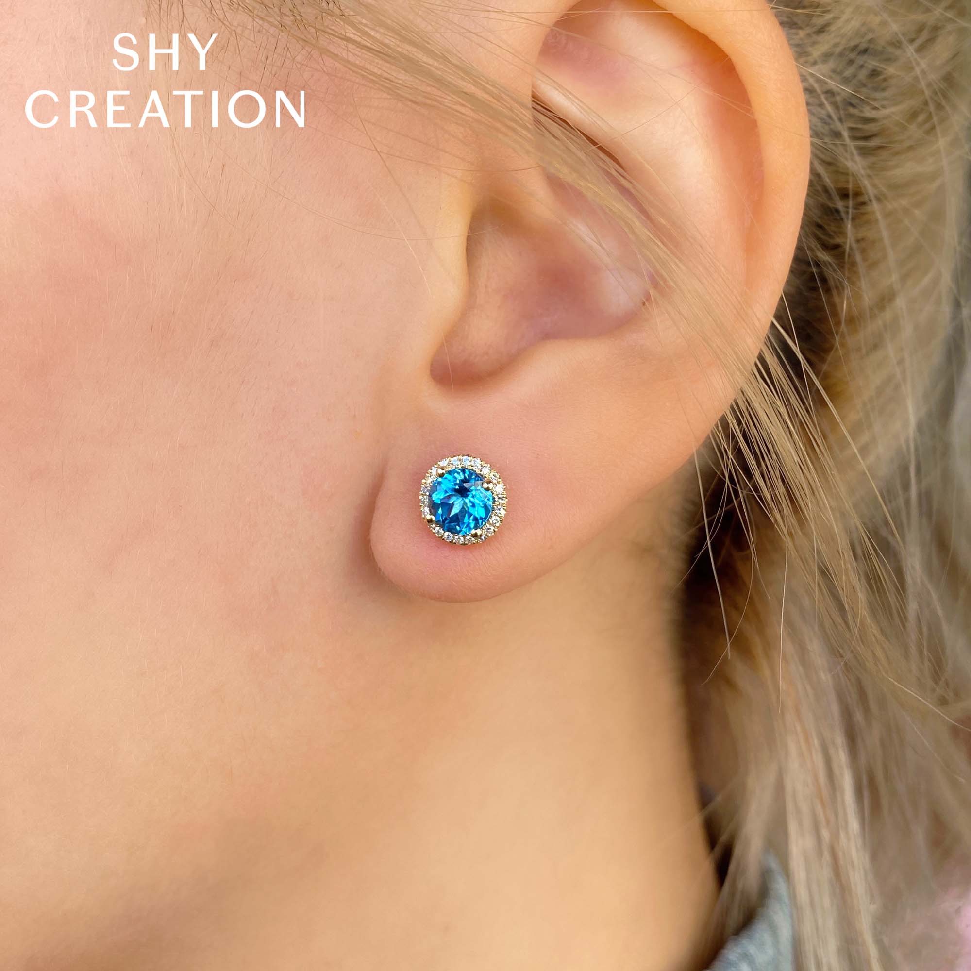 0.14CT DIAMOND & 2.06CT BLUE TOPAZ 14K W/G STUD EARRING