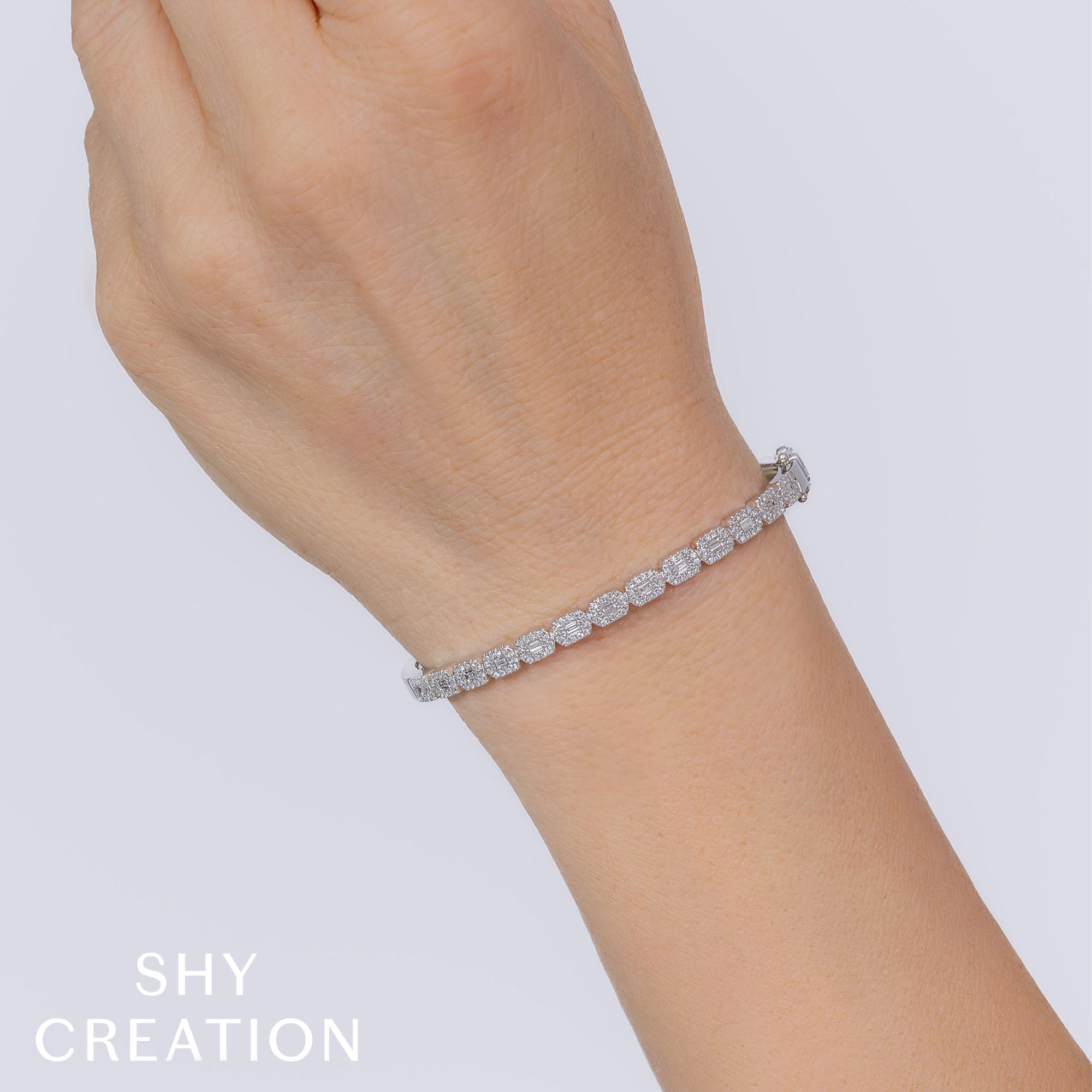 0.86CT 14K W/G DIAMOND BAGUETTE BANGLE