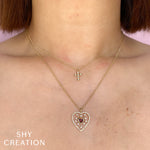 0.08CT 14K Y/G DIAMOND BEZEL CROSS NECKLACE
