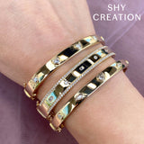 1.08CT 14K Y/G DIAMOND BAGUETTE MARQUISE BANGLE