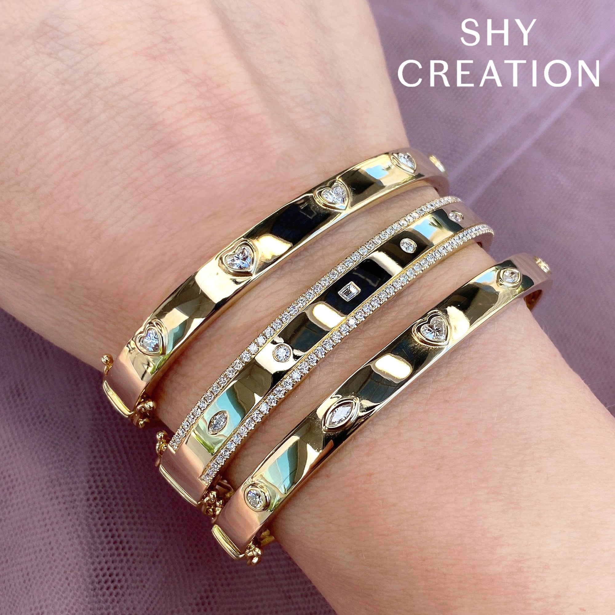 1.08CT 14K Y/G DIAMOND BAGUETTE MARQUISE BANGLE