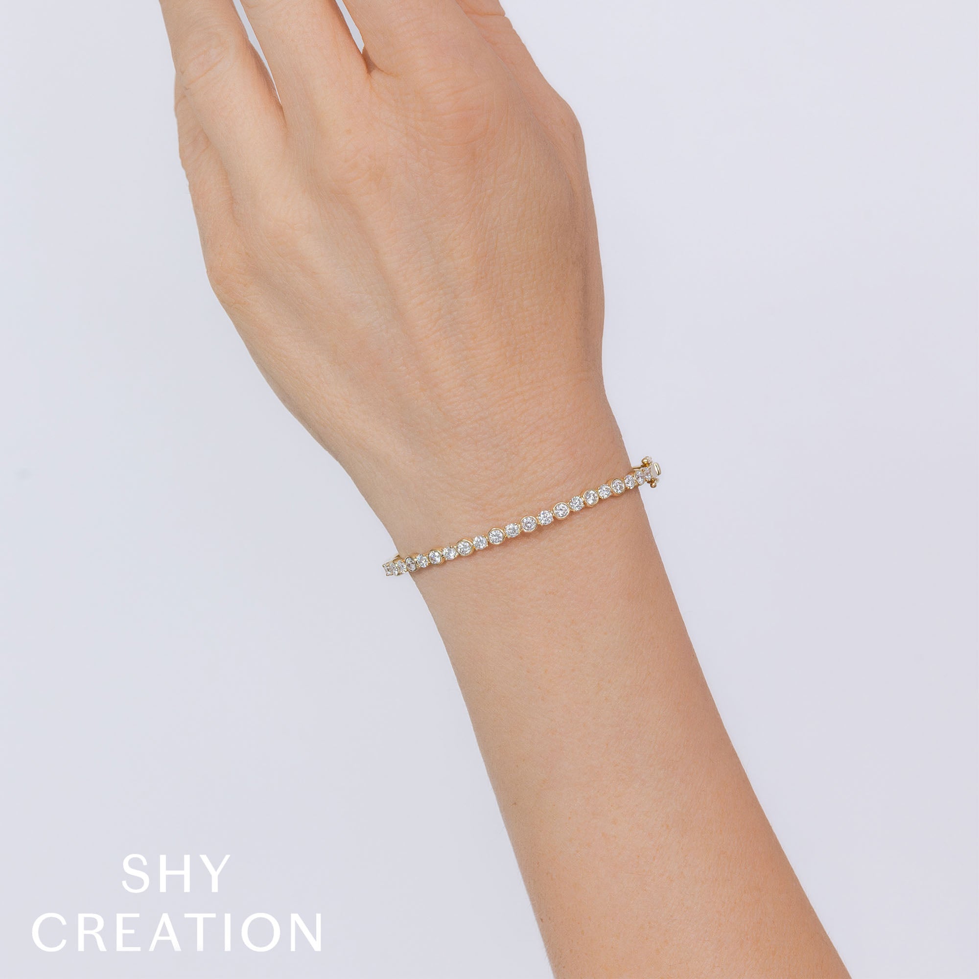 1.88CT 14K Y/G DIAMOND BEZEL BANGLE