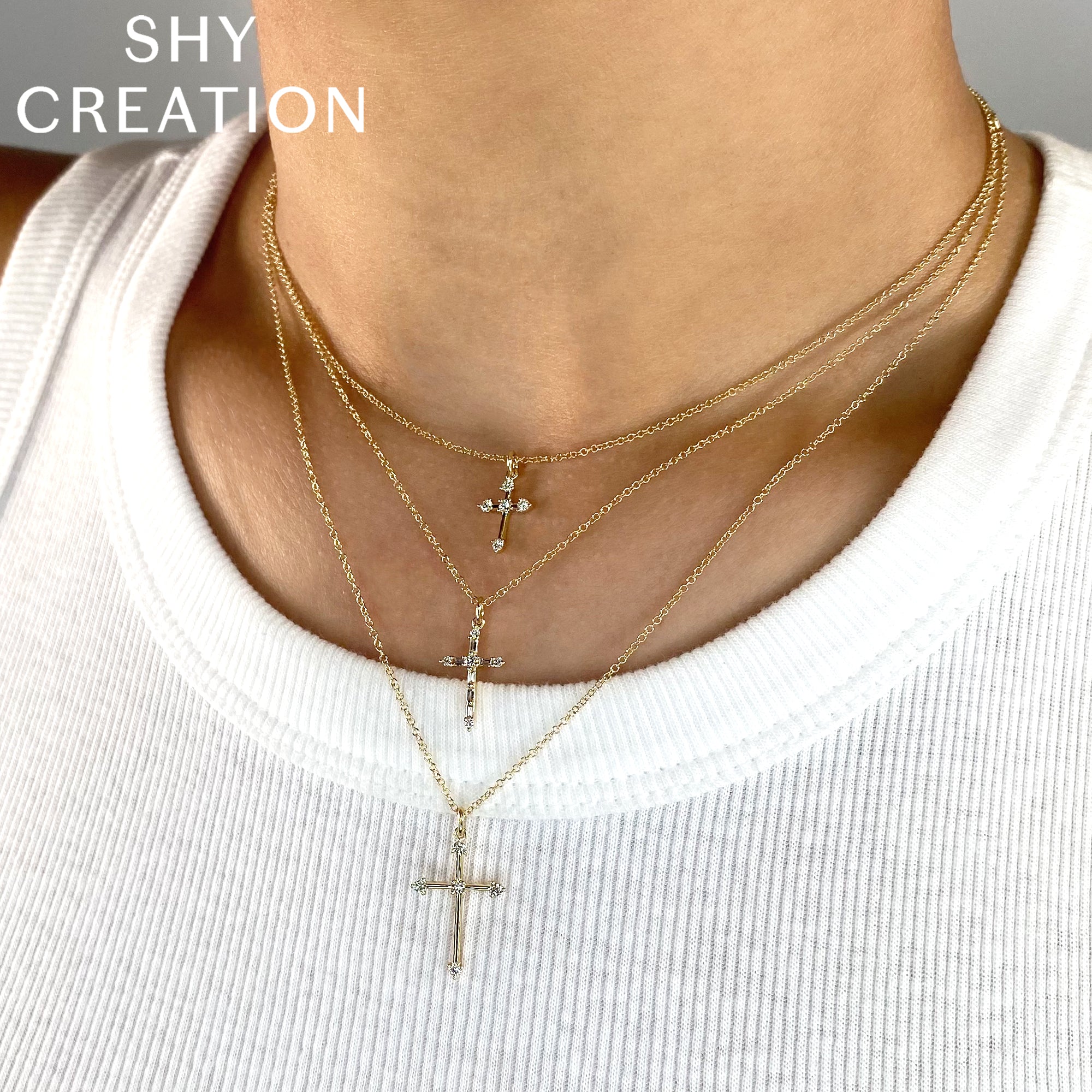 0.15CT 14K Y/G DIAMOND BAGUETTE CROSS NECKLACE