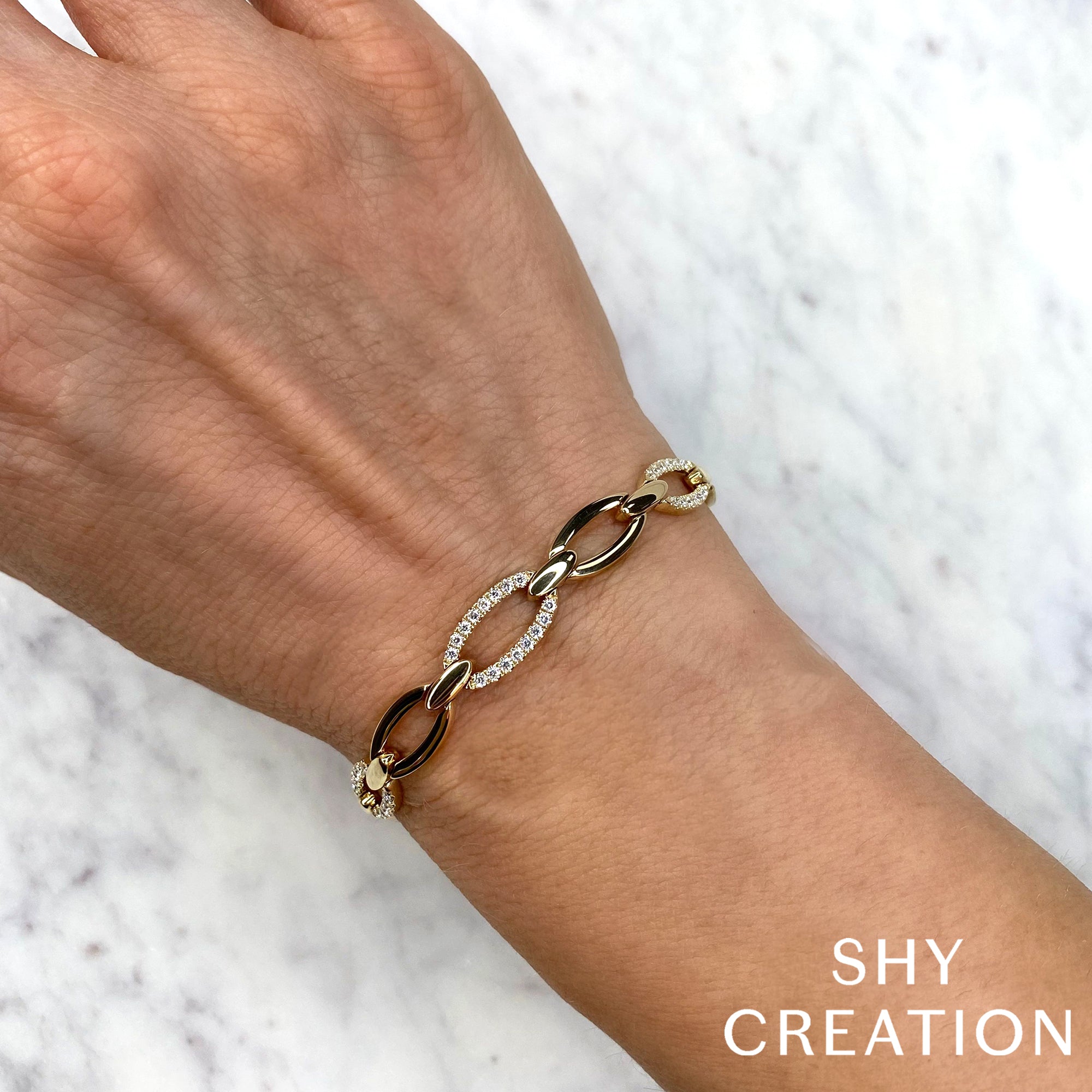 0.74CT 14K Y/G DIAMOND LINK BRACELET
