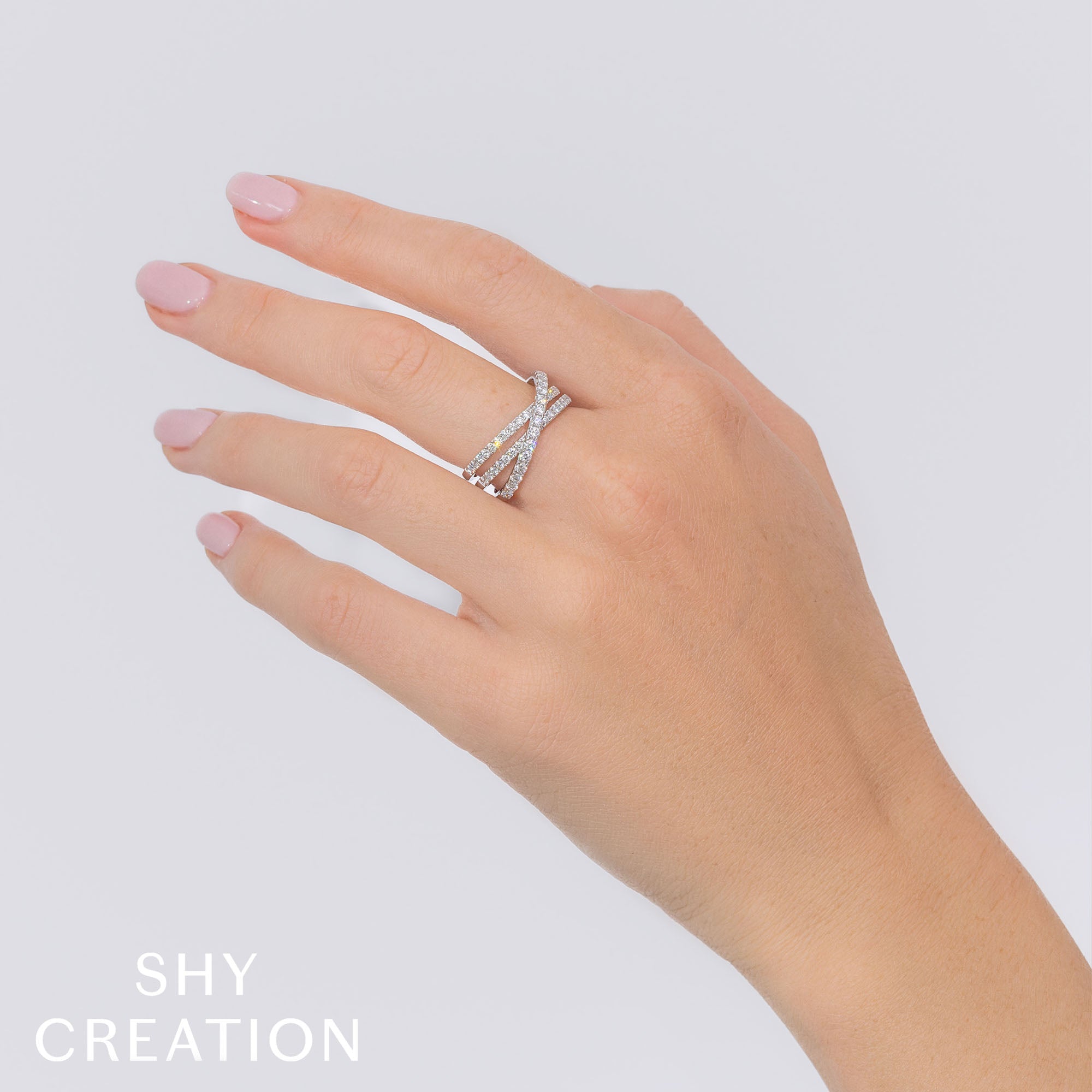 0.79CT 14K W/G DIAMOND BRIDGE RING
