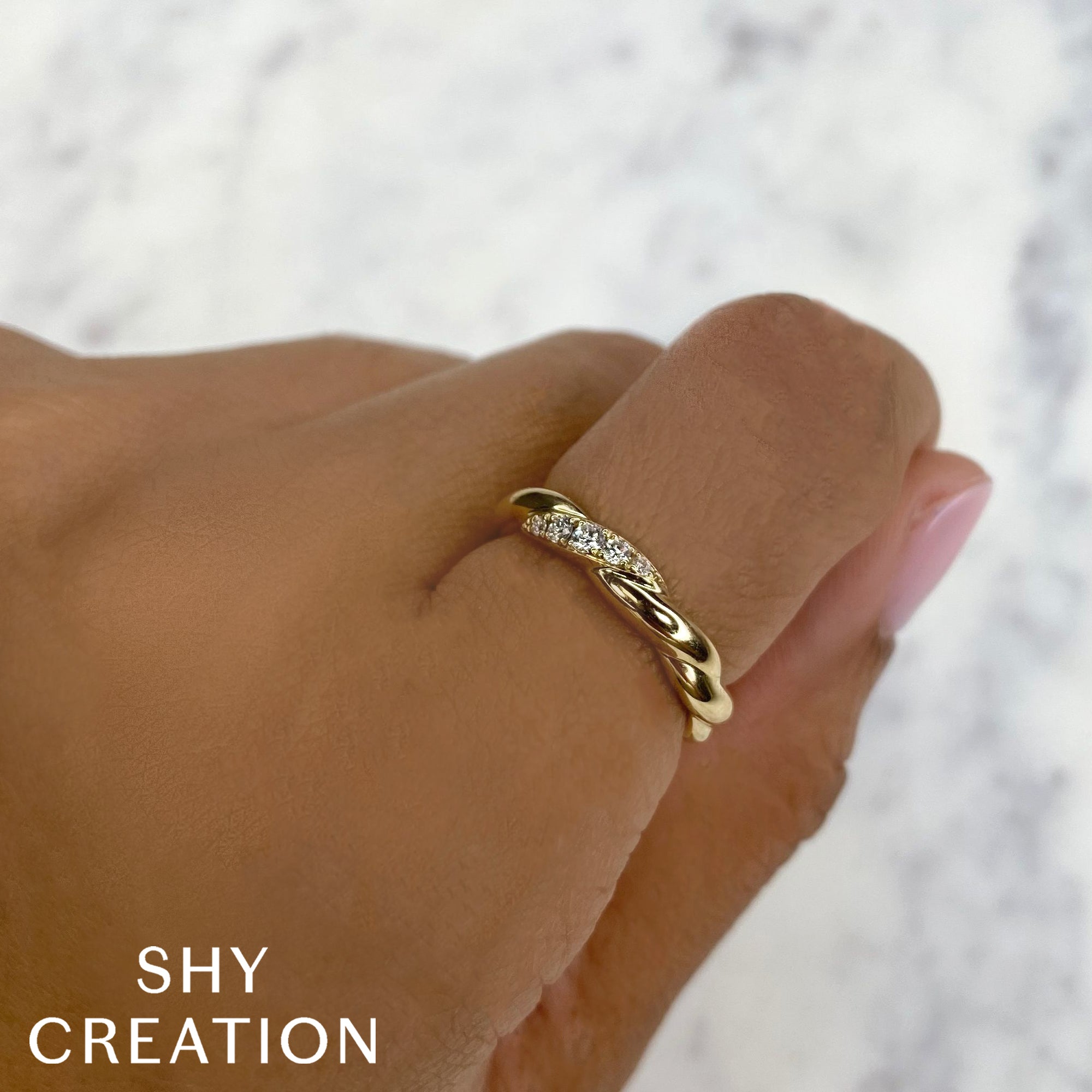 0.12CT 14K Y/G DIAMOND TWISTED BAND