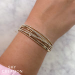 1.64CT 14K Y/G DIAMOND BRIDGE BANGLE