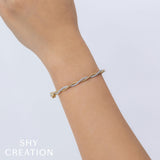 0.53CT 14K Y/G DIAMOND TWISTED BANGLE