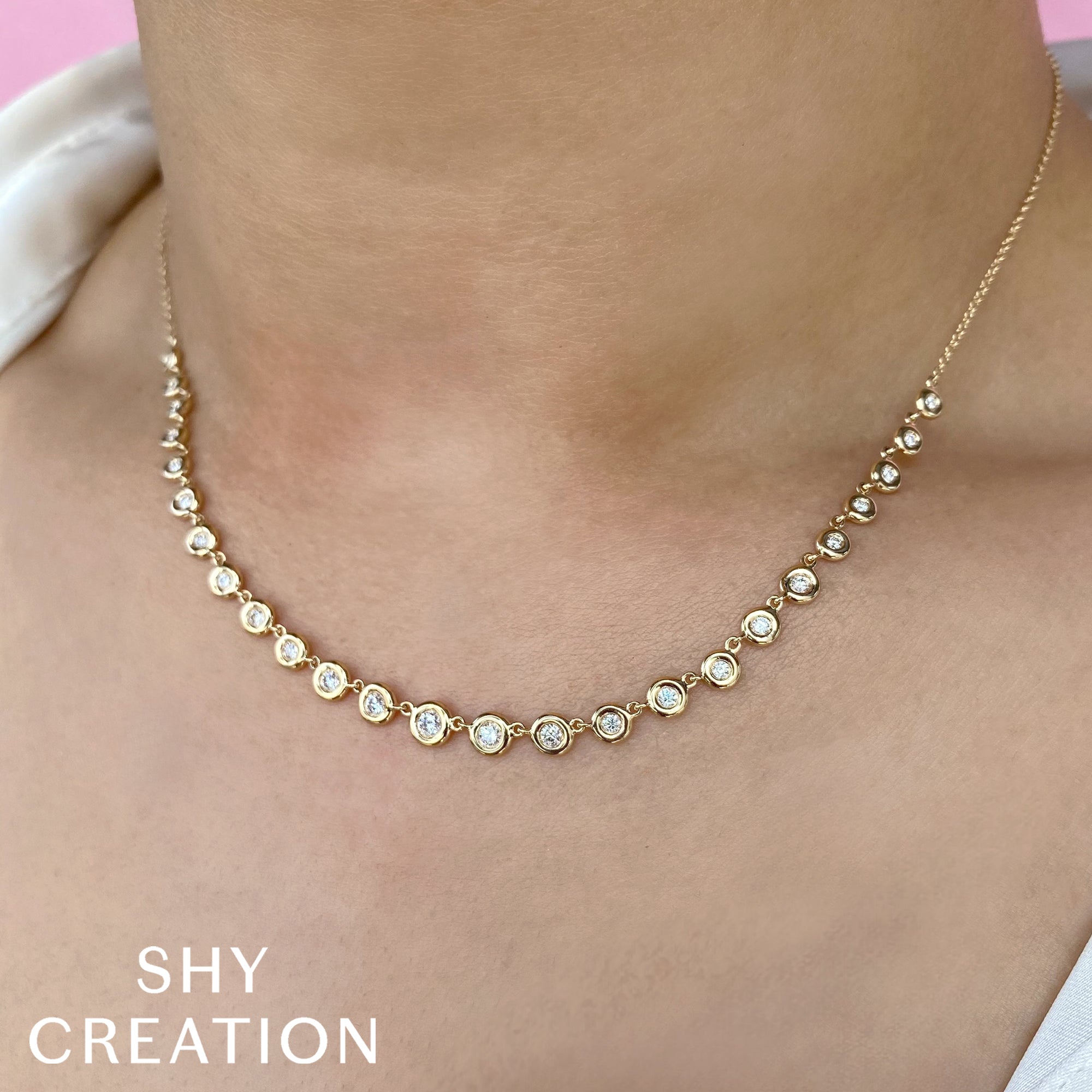 0.60CT 14K Y/G DIAMOND BEZEL NECKLACE