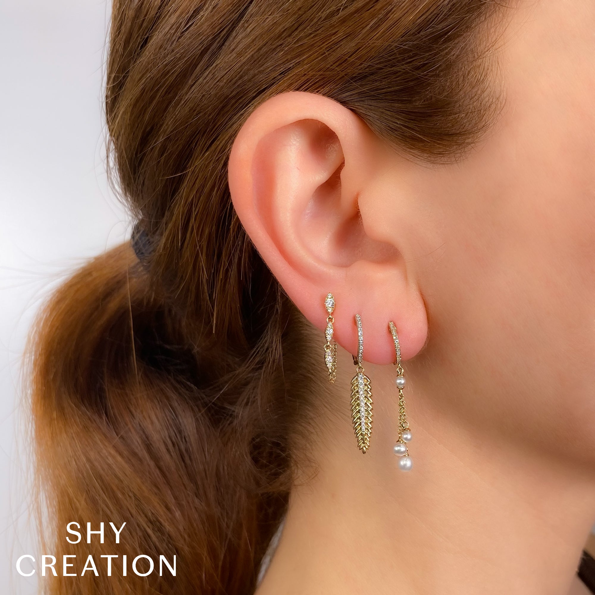 0.20CT 14K Y/G DIAMOND CHAIN EARRING