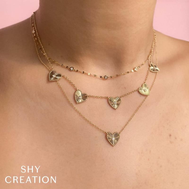 0.09CT 14K Y/G DIAMOND BEZEL RIBBED HEART NECKLACE