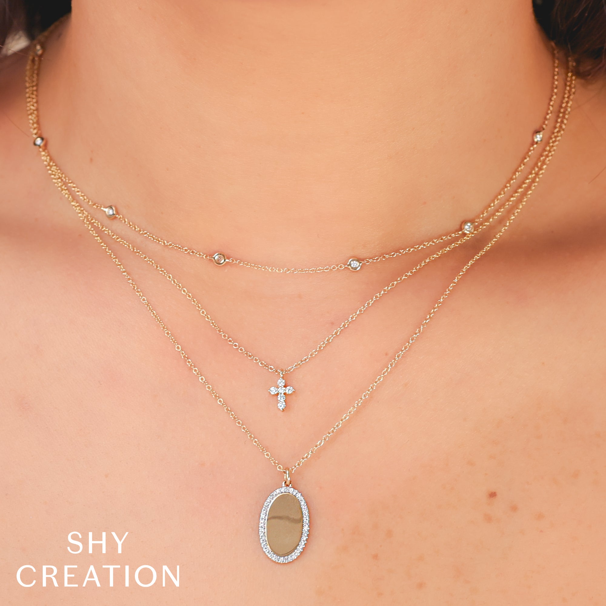 0.10CT 14K Y/G DIAMOND CROSS NECKLACE