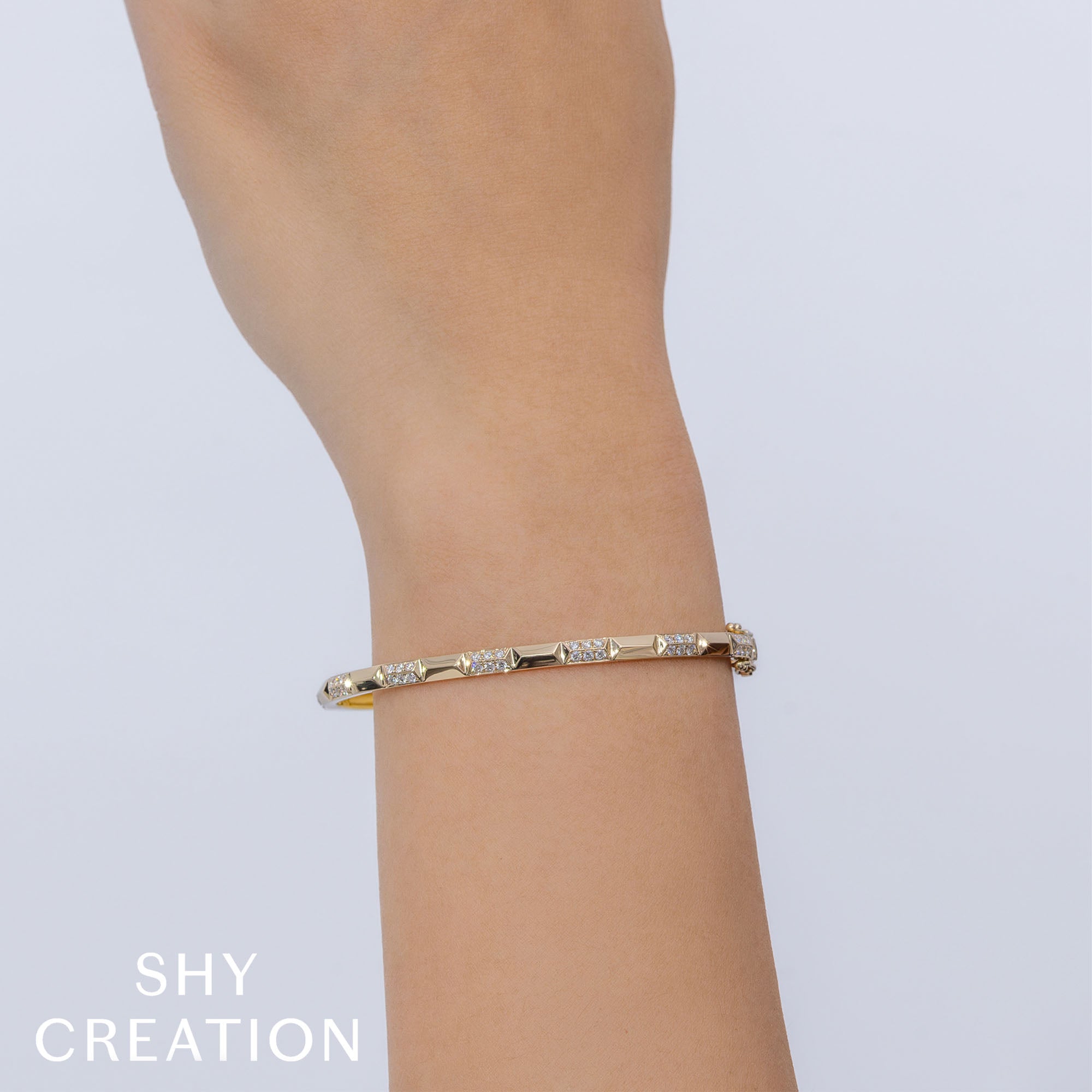 0.56CT 14K Y/G DIAMOND GEO CUT BANGLE