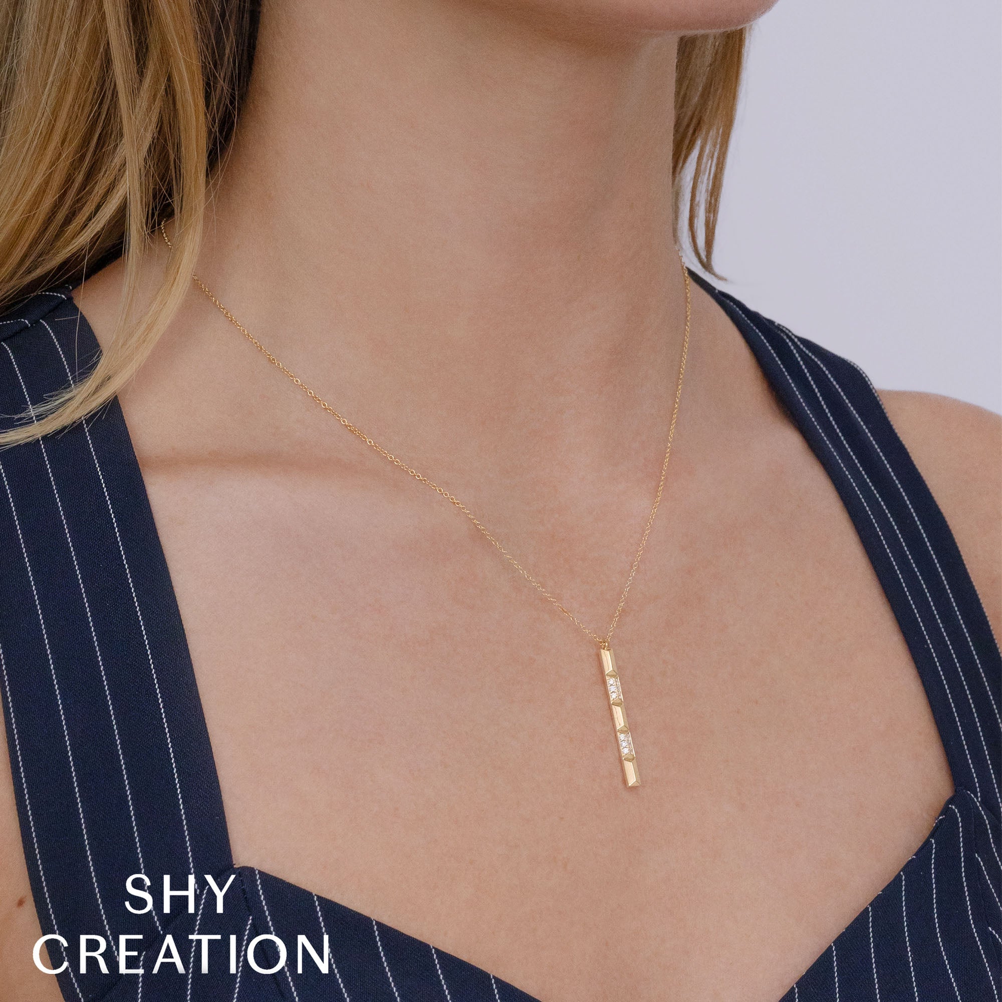0.17CT 14K Y/G DIAMOND GEO CUT NECKLACE