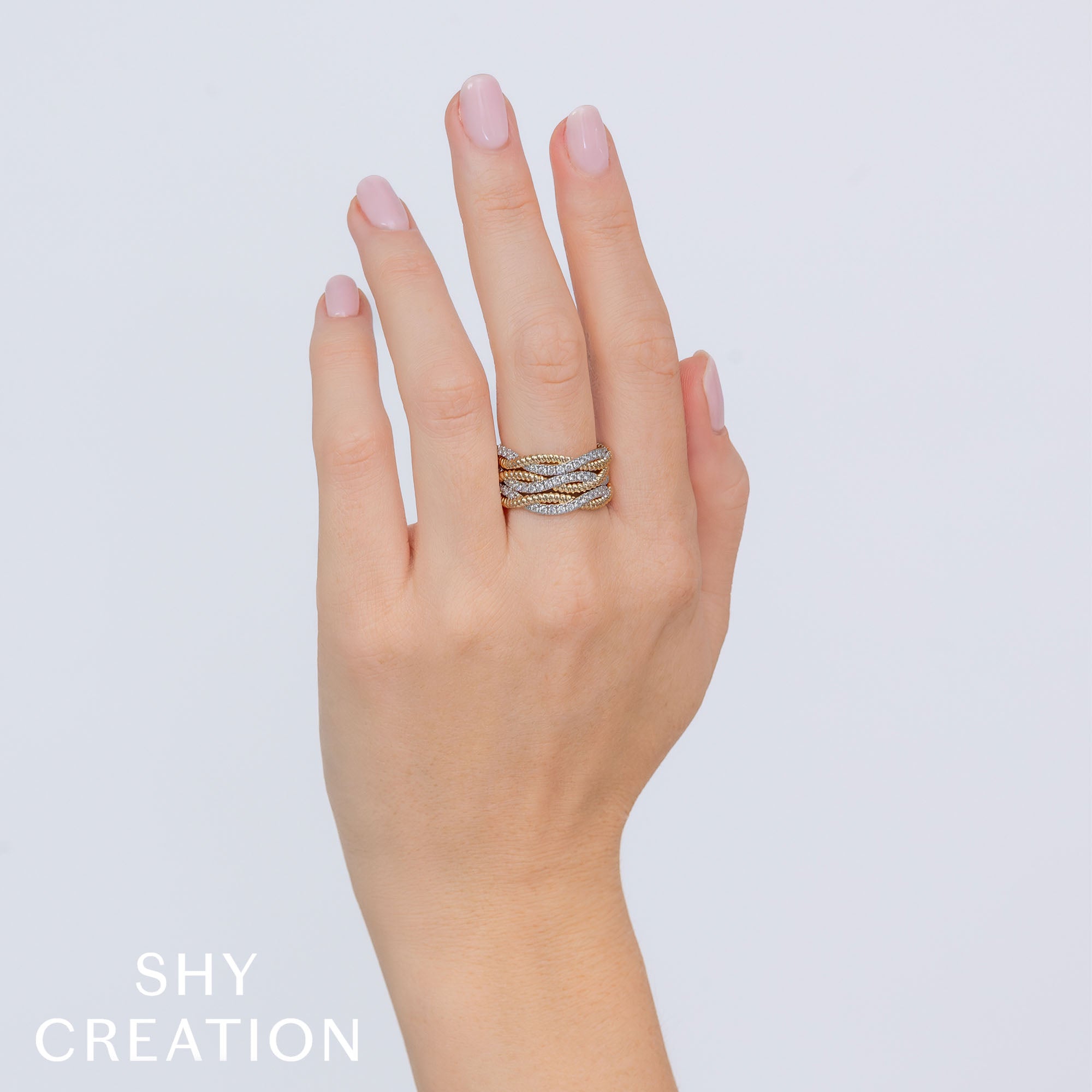 0.62CT 14K Y/G DIAMOND TWISTED RING