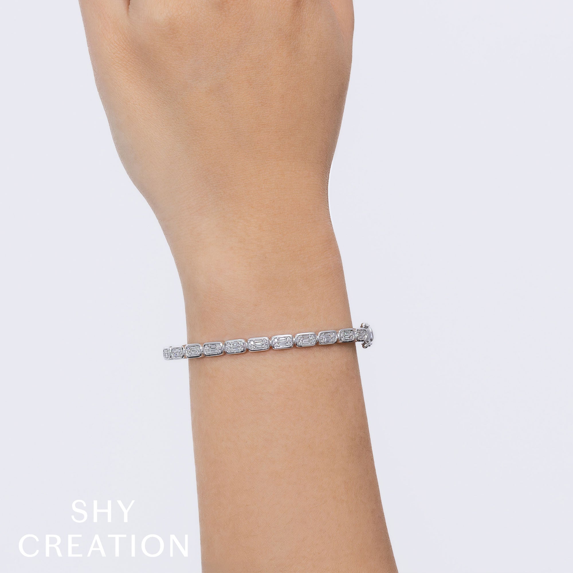 0.65CT 14K W/G DIAMOND BAGUETTE BANGLE