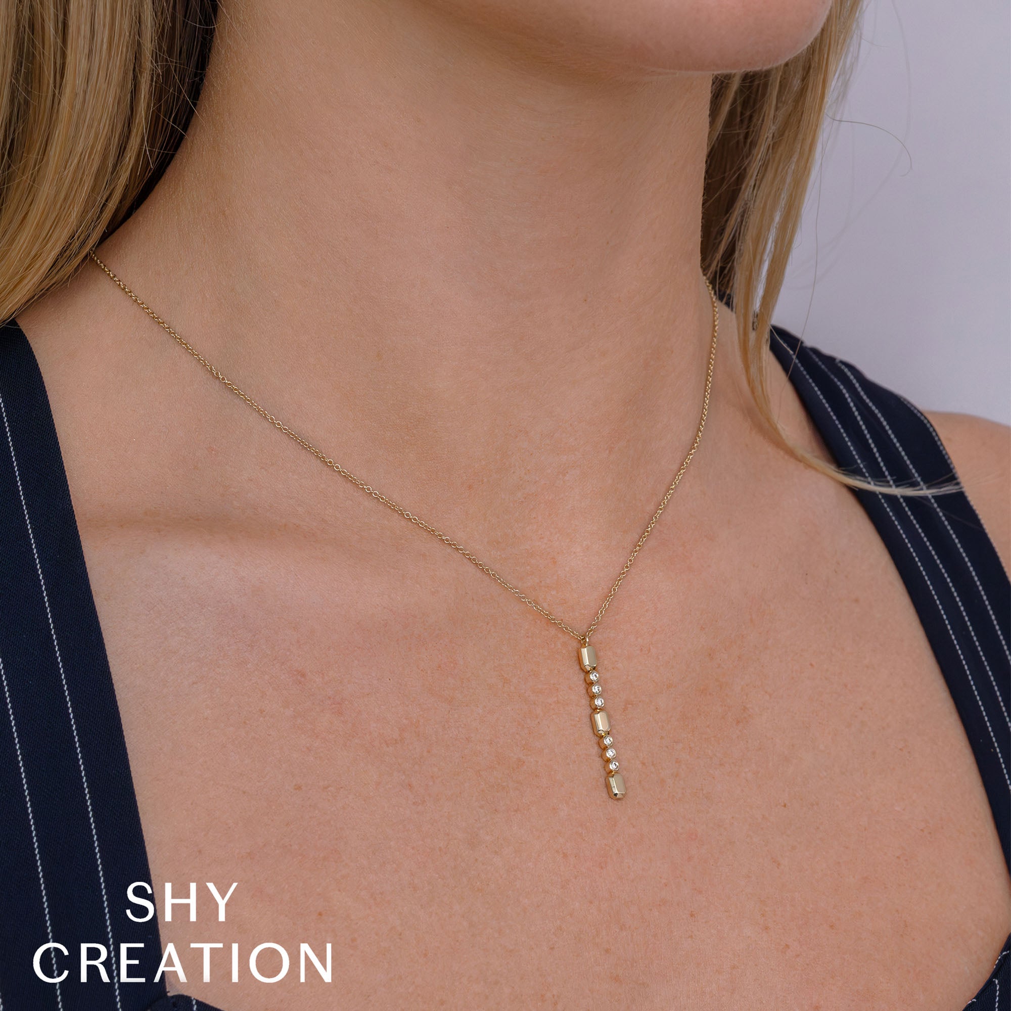 0.09CT 14K Y/G DIAMOND BEZEL GEO CUT LARIAT NECKLACE
