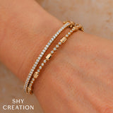 0.30CT 14K Y/G DIAMOND BEZEL GEO CUT BANGLE