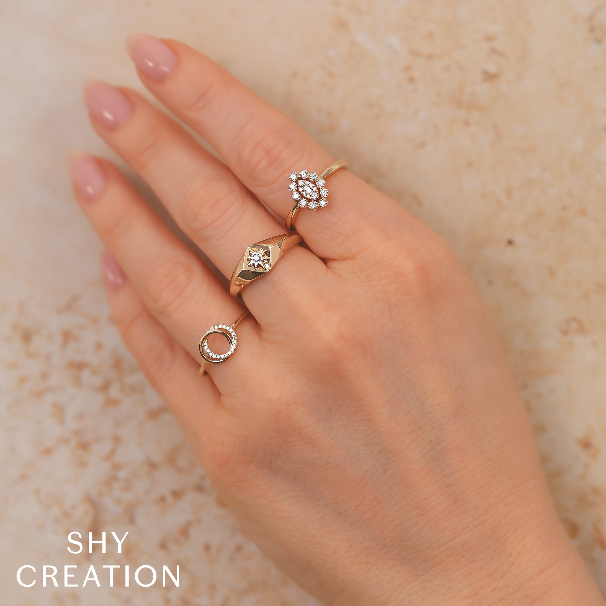 0.07CT 14K W/G DIAMOND LOVE KNOT CIRCLE RING