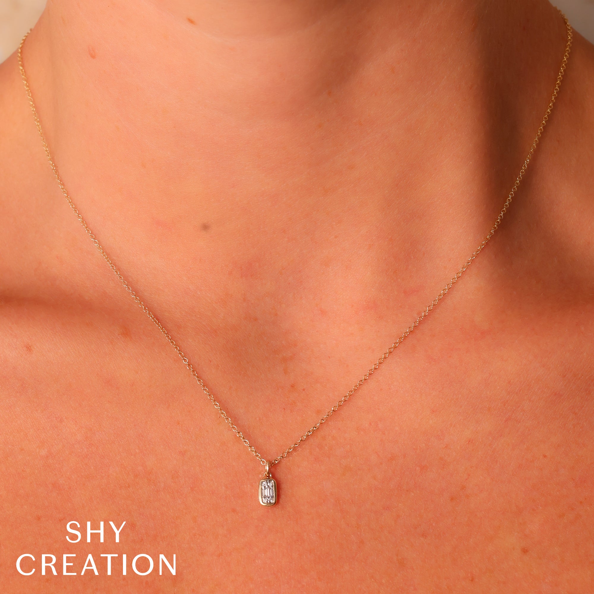 0.07CT 14K Y/G DIAMOND BAGUETTE NECKLACE