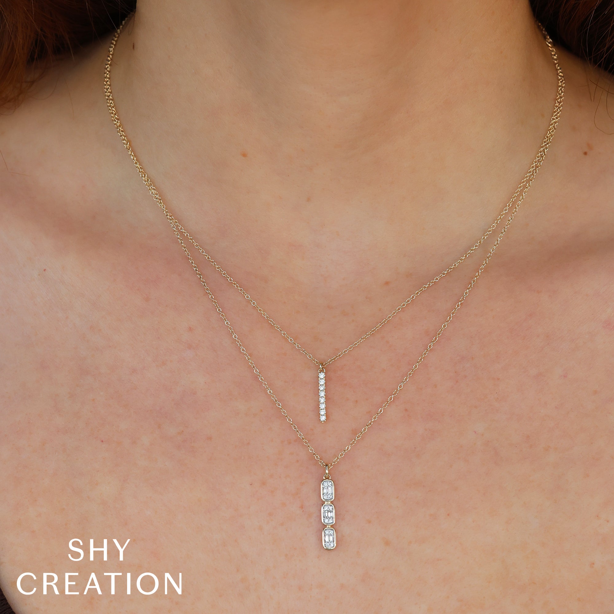 0.14CT 14K W/G DIAMOND BAGUETTE NECKLACE