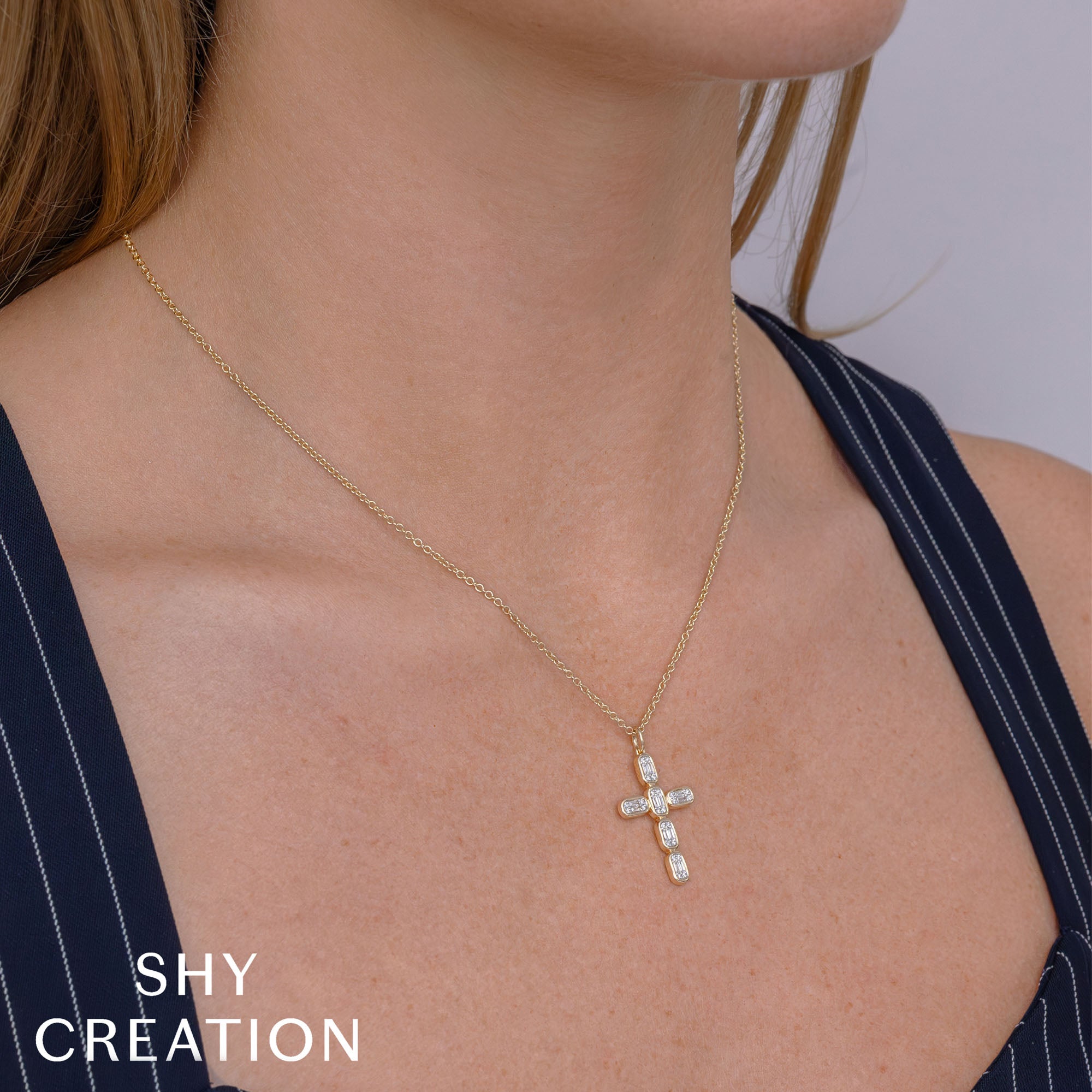 0.30CT 14K Y/G DIAMOND BAGUETTE CROSS NECKLACE