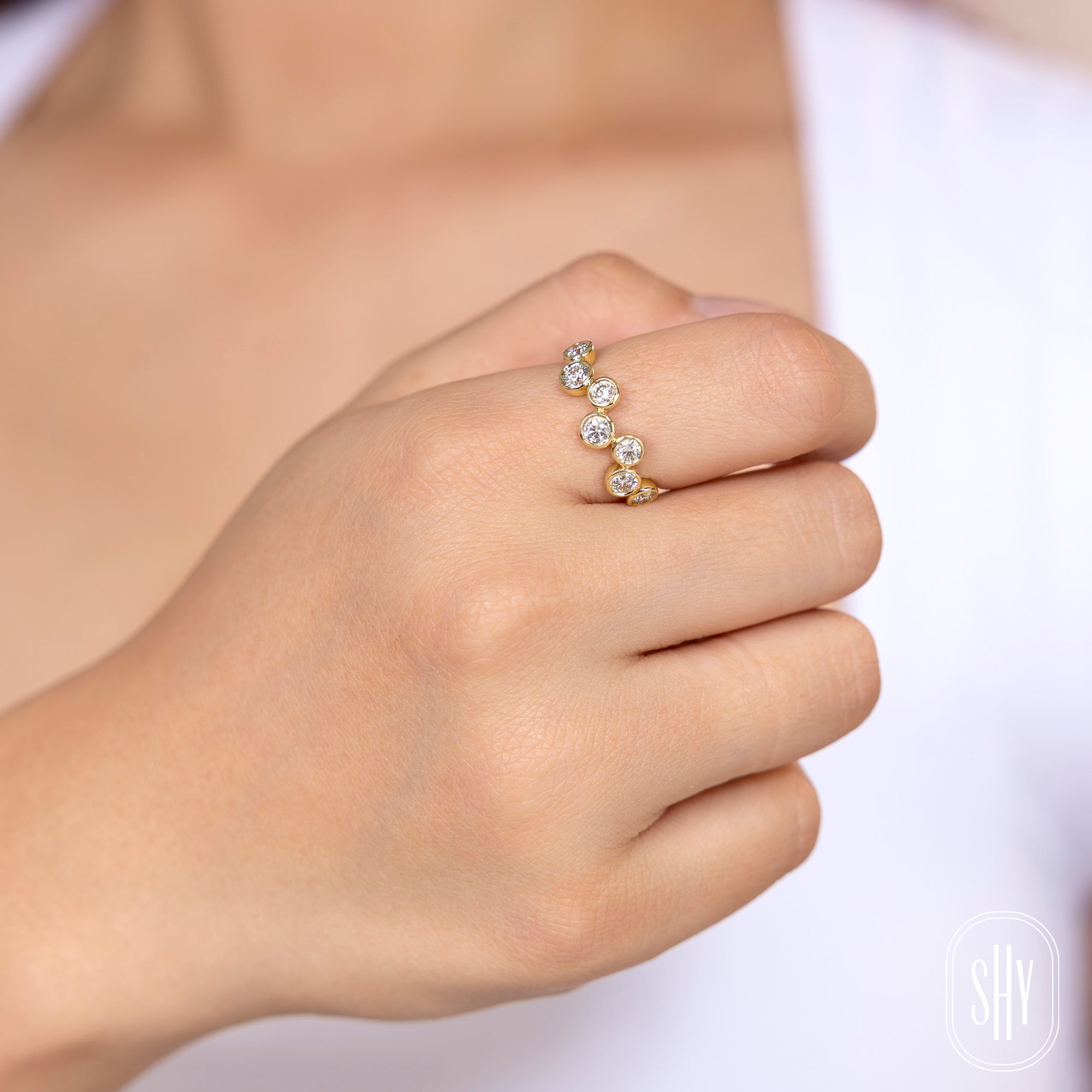 0.78CT 14K Y/G DIAMOND BEZEL RING